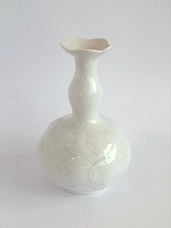 White porcelain Lotus vase with relief decoration, designed by Ludwig Zepner