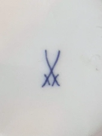 Blue underglaze crossed swords mark on the base of a vase