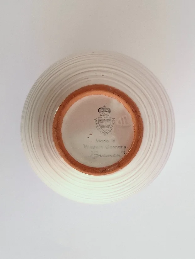 Underside of vase showing unglazed terracotta foot ring and stamped marks: Wächtersbach crown logo, Made in Western Germany, and Bremen