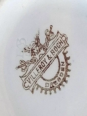 Blue stamped mark showing Mercury figure atop a shield, reading VILLEROY & BOCH DRESDEN